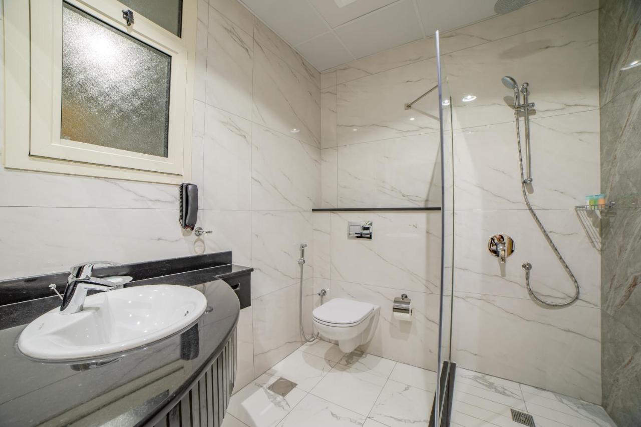 Platinum Coast Hotel Apartments Fujairah Exterior photo Bathroom with shower