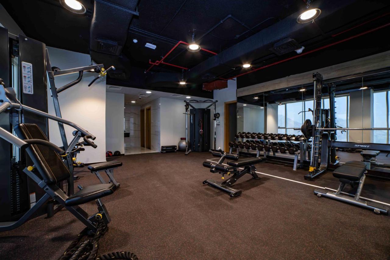 Platinum Coast Hotel Apartments Fujairah Exterior photo The gym at the 100000 sq ft (9,300 sq m) headquarters of the company in Hyderabad, India