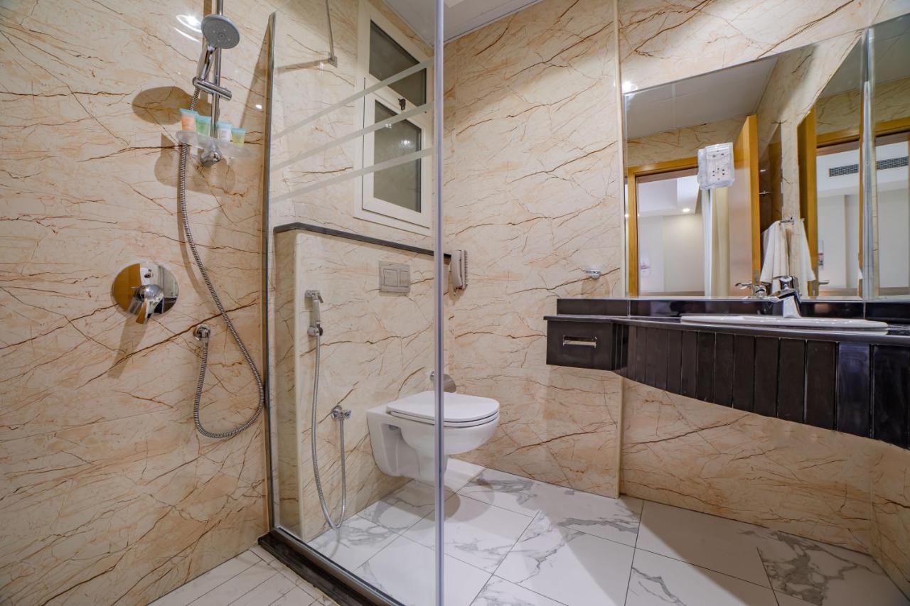 Platinum Coast Hotel Apartments Fujairah Exterior photo A shower enclosure