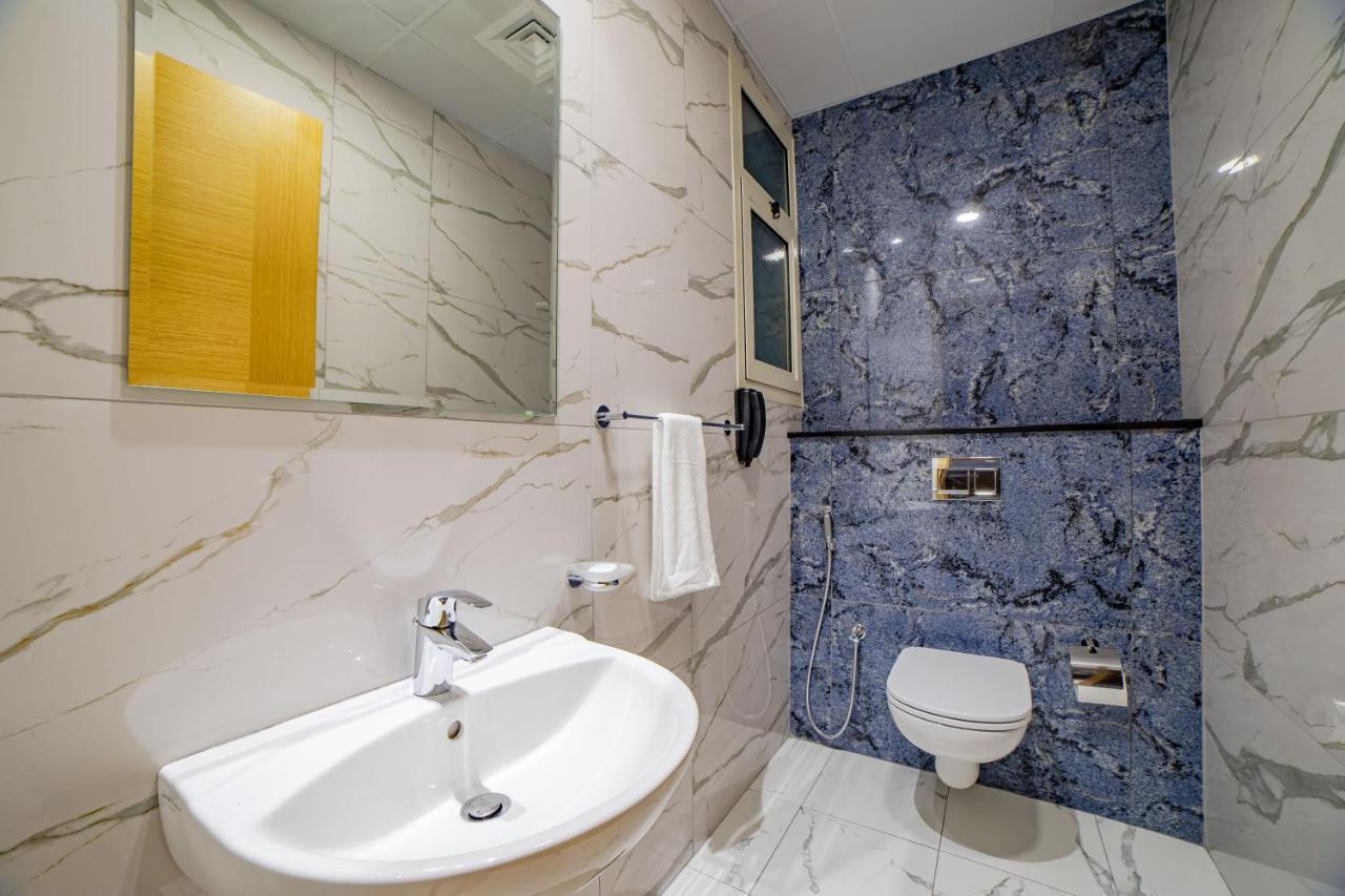Platinum Coast Hotel Apartments Fujairah Exterior photo Bathroom